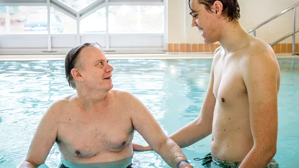 Two men in a swimming pool