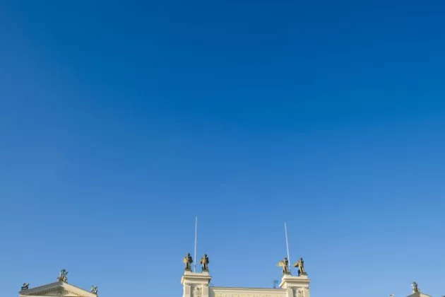 The university building against a blue sky.